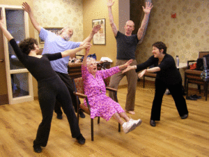 Ida Arbeit (center) rehearses with Kairos Dance Theatre members (l to r): Maria DuBois Genné, Peter Podulke, Jesse Neumann-Peterson and Carla Vogel. The scene will be featured in a dance performance at the St. Paul JCC on June 7. (Photo: Erin Elliott)