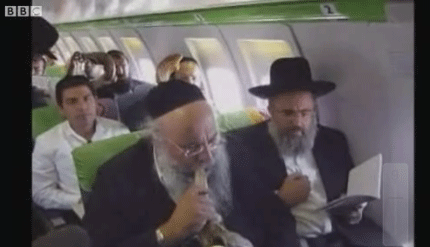 Video on BBC showed Jewish mystics attempting to ward off H1N1 in Israel during a flyover.