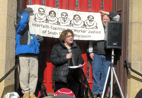 Rabbi Renee Bauer, director of the Interfaith Coalition for Worker Justice of South Central Wisconsin, addresses protesters at a prayer vigil Tuesday at the capitol building in Madison. (Photo: Courtesy Interfaith Coalition for Worker Justice)