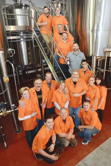 Shmaltz Brewing employees celebrating the company’s new facility in suburban Albany, N.Y., on May 13. (Photo: Courtesy of Shmaltz Brewing)