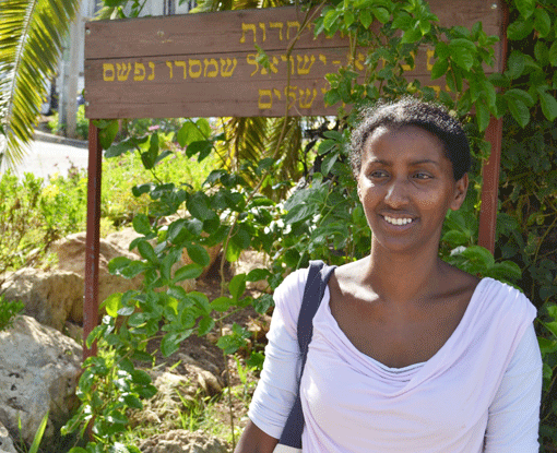 Racheli Yaso stands in front of the Ethiopian House at Yemin Orde Youth Village. (Photo: Mordecai Specktor)