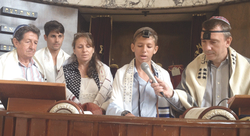 The bar mitzva of Abel Ashkanazi, second from right, was attended by Michael A. Appleman during his 20th mission to Cuba. Photo courtesy of Michael A. Appleman.