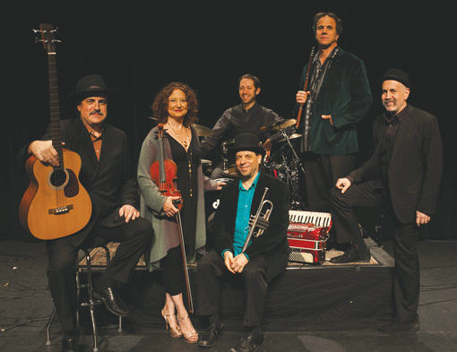 The Klezmatics (l to r): Paul Morrissett, Lisa Gutkin, Frank London (trumpet), Richie Barshay, Matt Darriau and Lorin Sklamberg. (Photo: Chuck Fishman)