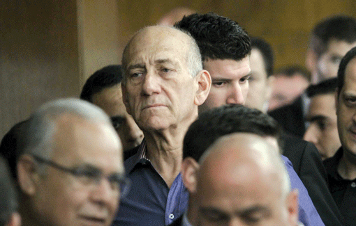 Former Prime Minister Ehud Olmert, seen in the courtroom of the District Court in Tel Aviv on March 31, where he was convicted of taking bribes when he was Jerusalem’s mayor. (Photo: Ido Erez / Pool / Flash 90)