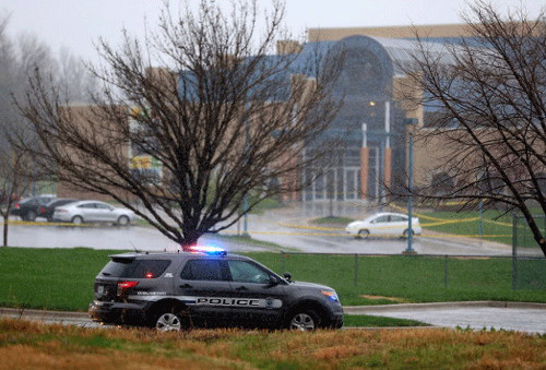 An Overland Park police vehicle sitting in front of the JCC of Greater Kansas City, Kan., following shootings there and later at a nearby assisted-living complex that killed a total of three people on Sunday. (Photo: Jamie Squire/Getty Images)
