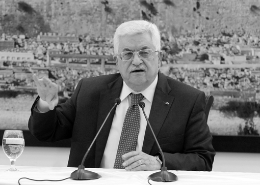 Palestinian Authority President Mahmoud Abbas meets with journalists in Ramallah on April 22, a day before his Fatah faction signed a reconciliation agreement with the militant group Hamas. This development could be a boon to Israeli-Palestinian peace negotiations, according to Moshe Git. (Photo: Palestinian Press Office via Getty Images)