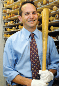 Jeff Idelson, director of the National Baseball Hall of Fame and Museum, holding a bat used by Jewish Hall of Famer Hank Greenberg. (Photo: Milo Stewart Jr. / National Baseball Hall of Fame)