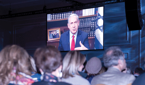 Israeli Prime Minister Benjamin Netanyahu addressing the Jewish Federations of North America's General Assembly at National Harbor, Md., via satellite, on Nov. 11. (Photo: Ron Sachs)