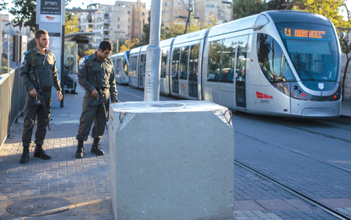 A concrete security barrier at a light rail station in Jerusalem on Nov. 6. Four people have been killed at light rail stations in two separate attacks in recent weeks. (Photo: Yonatan Sindel / Flash90)