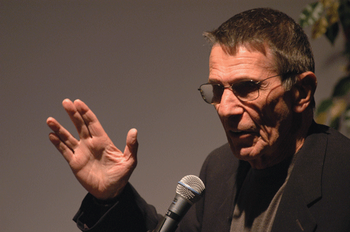 Leonard Nimoy, shown in 2002, demonstrating Spock’s Vulcan salute devised from a Jewish prayer. (Photo: Michel Boutefeu/Getty Images)