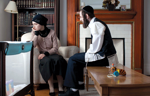 Israeli actress Hadas Yaron plays Meira, whose husband, Shulem (played by Luzer Twersky), is portrayed as unequipped to deal with his beloved wife’s decidedly unorthodox behavior. (Photo: Oscilloscope Laboratories)