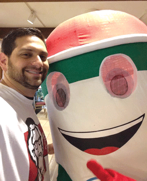 Rabbi Jeremy Fine, pictured with the mascot from Rita’s Italian Ice.