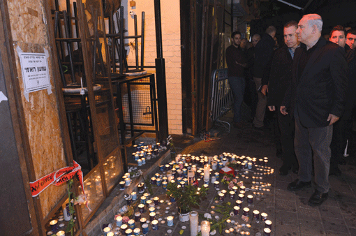 Israeli Prime Minister Benjamin Netanyahu visiting the scene of a deadly shooting in Tel Aviv the night after the attack, on Jan. 2. (Photo: Haim Zach / GPO)