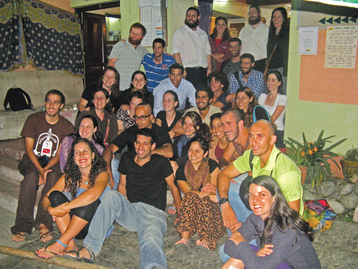 Rabbi Chezki Lifshitz (left in upper row) with hikers at the Chabad House of Kathmandu in March 2012. (Photo: Courtesy of Chabad Nepal)