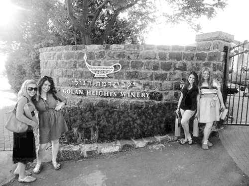 Elianna Mintz (second from left), along with fellow participants in the Committee for the Accuracy of Middle East Reporting in America’s program, spent time at the Golan Heights Winery on a recent visit to Israel. (Photo: Courtesy of Elianna Mintz)