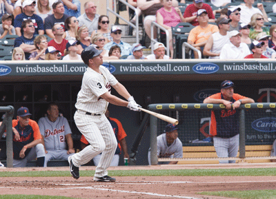 Danny Valencia, who connects in a game against the Tigers, has endured a frustrating season on a team hobbled by injuries to key players. (Photo: Wayne Kryduba / Minnesota Twins)