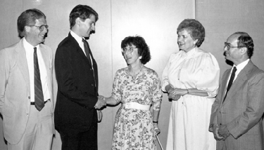 Howard Orenstein (second from left) was the guest speaker at the Jewish Family Service annual meeting in June 1987. Also pictured are (l to r): George Winter, JFS president; Joan Bream, JFS supervisor of services to the elderly; Joyce Selg, office manager; and Peter Glick, JFS executive director. (Photo: AJW Photo Archive)