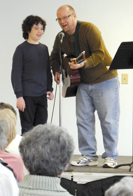 Jacob Zelonky is pictured with his father, Robb Zelonky, who performed Yiddish songs.