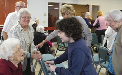 Jacob Zelonky, who plays Michael in the touring company of Billy Elliot, visited residents at Knollwood Place and Sholom Home West on Jan. 3. (Photos courtesy of Sholom Community Alliance)