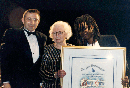 Miep Gies, who helped hide Anne Frank and her family, receiving the the Wiesenthal Centers Righteous Among the Nations Award in Los Angeles on May 12, 1994 from Rabbi Marvin Hier, the centers founder and dean, and actress Whoopi Goldberg. Gies died on Jan. 11. (Photo: Bart Bartholomew / Simon Wiesenthal Center)