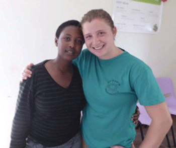 Elana Orbuch is pictured at the Agahozo-Shalom Youth Village with one of the first-year students she tutors in English. (Photo: Courtesy of Elana Orbuch)
