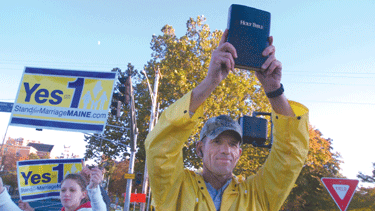 A supporter of the Question 1 ballot measure in Maine holds up his Bible, in a scene from the documentary Question One. (Photo: Courtesy of Fly On The Wall Productions)