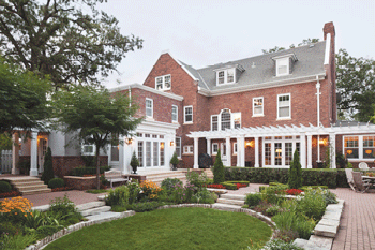 Architect Joe Metzler, of SALA Architects, Inc., and Vujovich Design Build created an extensive three-story addition that included a new upstairs bedroom, renovated kitchen, and a basement home gym with an indoor resistance pool, among other features. (Photo: Troy Thies Photography)