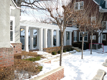 Before construction, the garage was connected to the home by a trellis system, which was removed and replaced by an addition. (Photo: Courtesy of Vujovich Design Build)