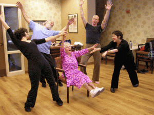 Ida Arbeit (center) rehearses with Kairos Dance Theatre members (l to r): Maria DuBois Genné, Peter Podulke, Jesse Neumann-Peterson and Carla Vogel. The scene will be featured in a dance performance at the St. Paul JCC on June 7. (Photo: Erin Elliott)